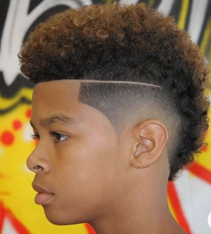 Straight fade on brown mohawk hairstyle